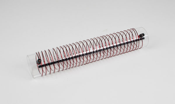 Coil with variable number of turns per unit length