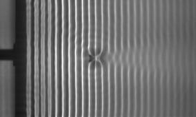 Diffraction of water waves at a slit and at an obstacle