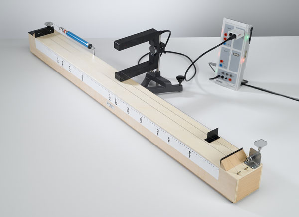 Determining the oscillation frequency of a string as a function of the string length and tension