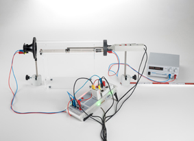 Determining the velocity of sound in air as a function of the temperature