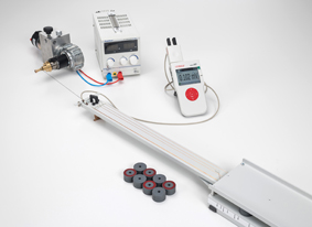 Measuring the induction voltage in a conductor loop moved through a magnetic field