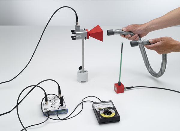 Qualitative demonstration of guiding of microwaves along a metal waveguide